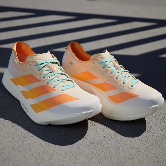 adidas Adizero Adios Pro 4 crystal sand/flash orange/flash aqua (Damen)