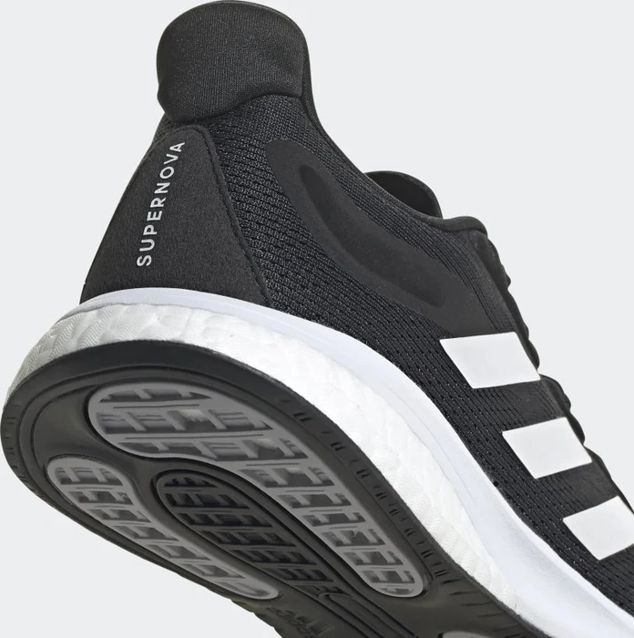 adidas Supernova core black/cloud white/halo silver (Damen)