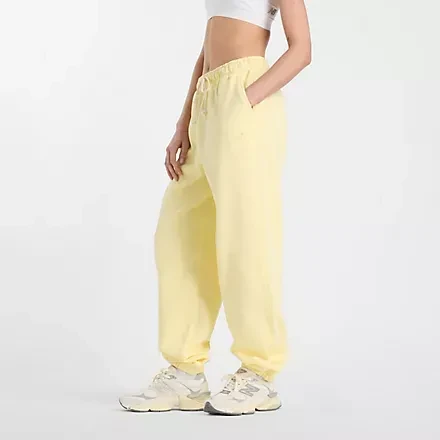 New Balance Athletics French Terry Trainingshose lang parchment (Damen)