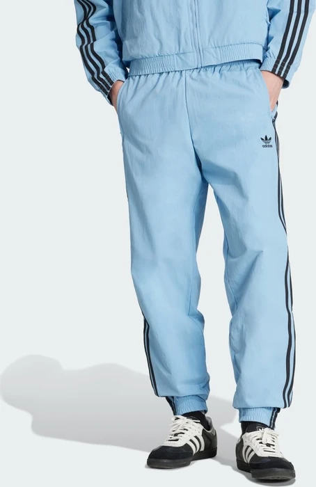adidas Adicolor Woven Firebird Trainingshose lang ash blue/black (Herren)