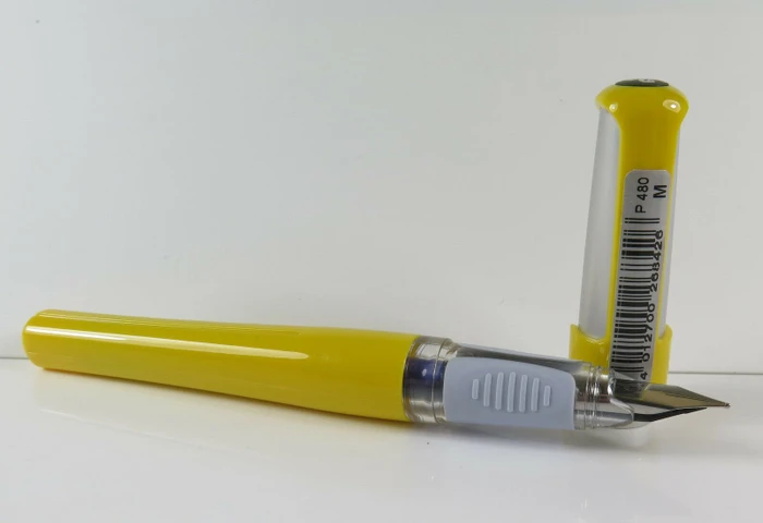 Pelikan Pelikano gelb/grau, rechte Hand, mittel, Faltschachtel