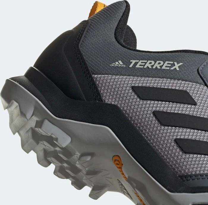 adidas Terrex AX3 light granite/core black/activ gold (Herren)