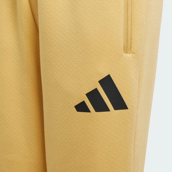adidas Tapered-Leg Z.N.E. Trainingshose lang oat/black (Junior)