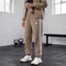 adidas Train Essentials 3-Streifen Woven Trainingshose lang khaki six (Damen) Vorschaubild