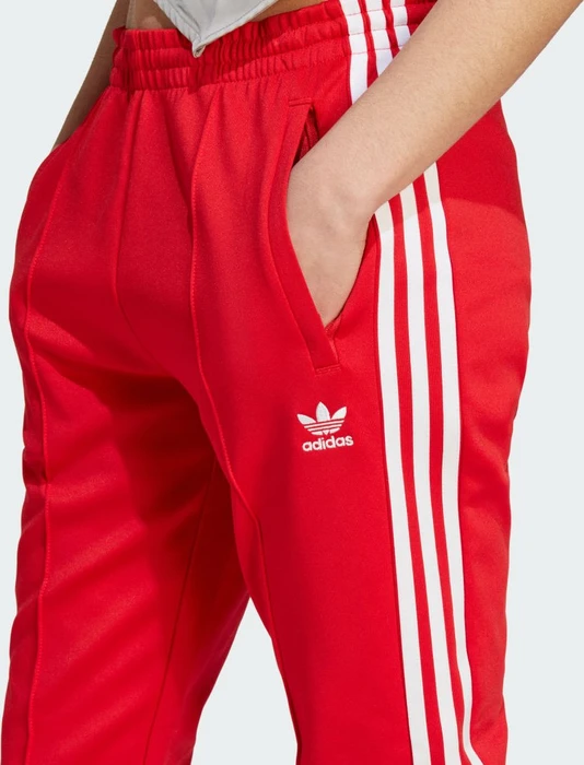 adidas Adicolor SST Trainingshose lang better scarlet (Damen)