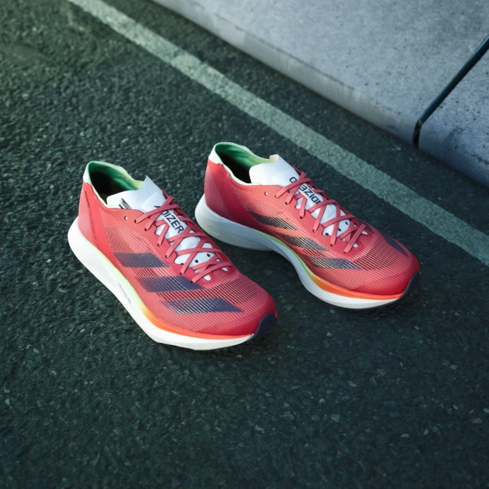 adidas Adizero Takumi Sen 10 preloved scarlet/aurora metallic/bright red (Damen)