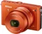 Nikon 1 J4 orange mit Objektiv 1 NIKKOR 10-30mm 3.5-5.6 PD-Zoom VR Vorschaubild