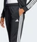 adidas Essentials 3-Streifen Trainingsanzug schwarz (Damen) Vorschaubild