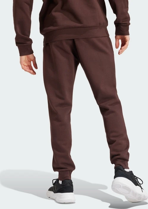 adidas Essentials Fleece Regular Tapered Trainingshose lang shadow brown (Herren)