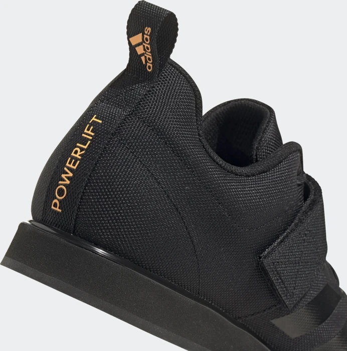 adidas Powerlift 4 core black/solar gold (Herren)