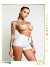 Calvendo Erotikpuzzle mit Melissa - tätowierter Akt in weißen Shorts, selbstbewusst und freizügig inszeniert