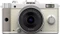 Pentax Q weiß mit Objektiv Q 02 Standard Zoom 5-15mm 2.8-4.5 AL Vorschaubild