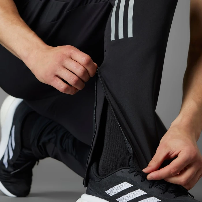 adidas Own the Run Astro Knit Trainingshose lang schwarz (Herren)