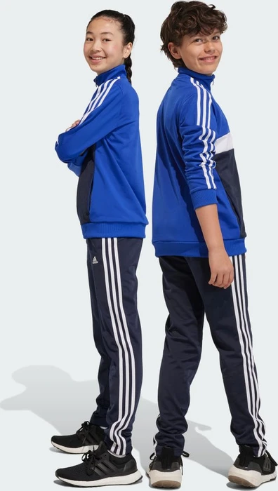adidas Essentials 3-Streifen Tiberio Trainingsanzug semi lucid blue/white (Junior)