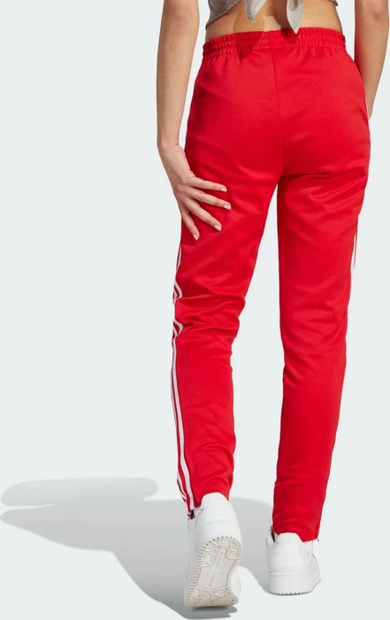 adidas Adicolor SST Trainingshose lang better scarlet (Damen)