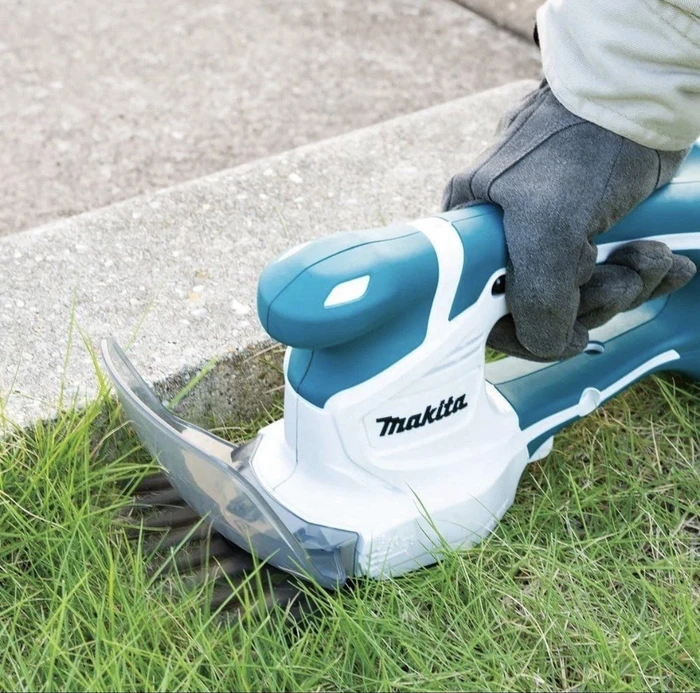 Makita UM110DWYX G-Serie Akku-Grasschere inkl. Akku 1.5Ah