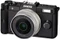 Pentax Q schwarz mit Objektiv Q 01 Standard Prime 8.5mm 1.9 AL und Q 02 Standard Zoom 5-15mm 2.8-4.5 AL Vorschaubild