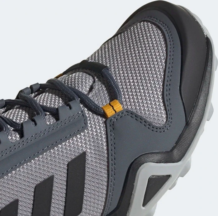 adidas Terrex AX3 light granite/core black/activ gold (Herren)