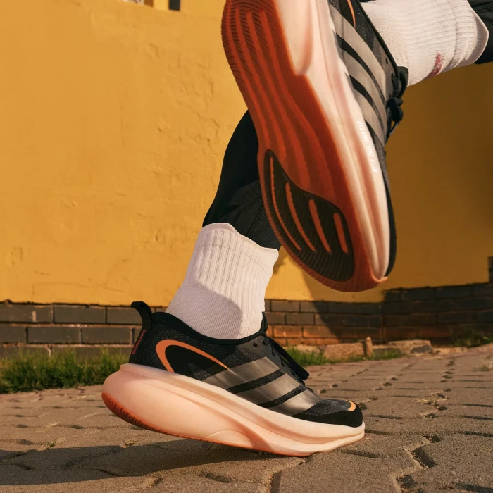 adidas Supernova Glide core black/iron metallic/lucid orange (Herren)