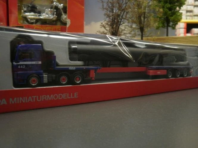 Herpa MAN TGX GX Wechselkoffer-Hängerzug DHL