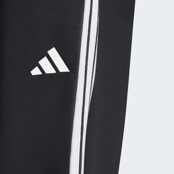 adidas Essentials 3-Streifen French Terry Cuffed Trainingshose lang schwarz/weiß (Damen)