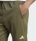 adidas Train Essentials Seasonal Woven Trainingshose lang olive strata/pulse lime (Herren) Vorschaubild