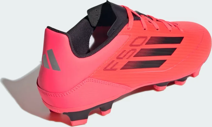 adidas F50 Club FxG turbo/aurora black/platinum metallic