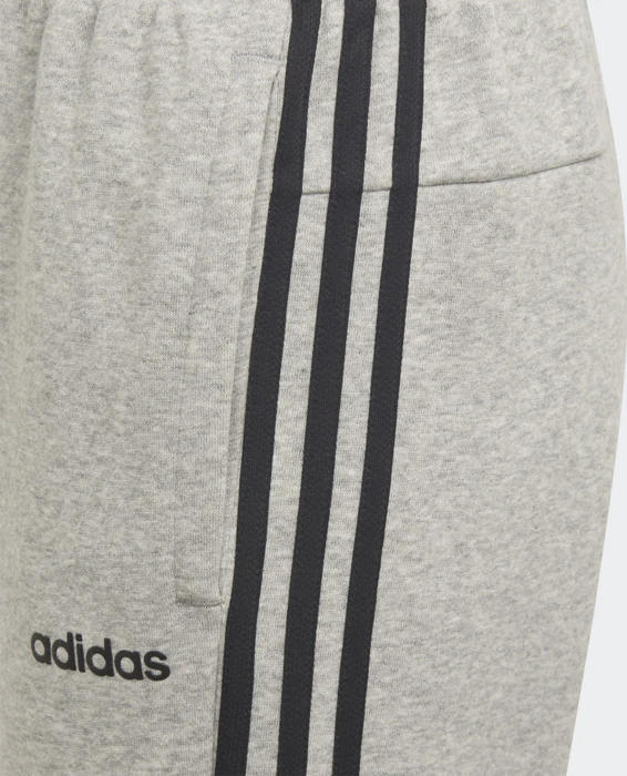 adidas Essentials 3-Streifen Trainingshose lang medium grey heather/black (Junior)